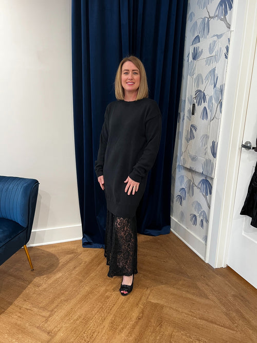 sweater dress with lace trim bottom in black