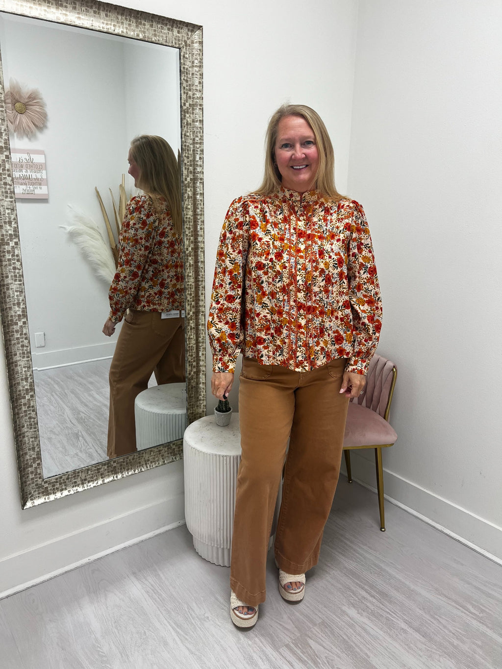 floral print top with brown pants