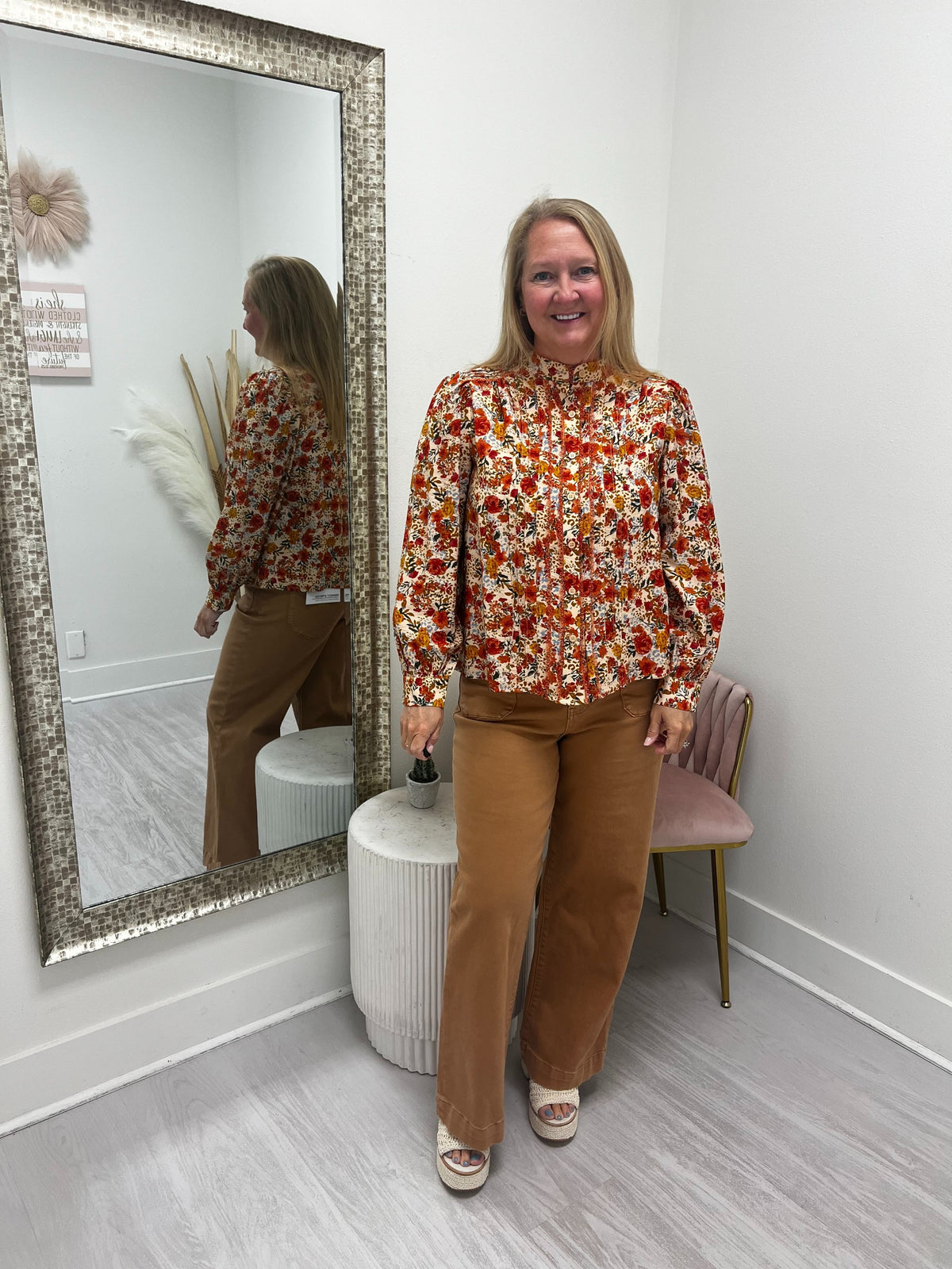floral print top with brown pants